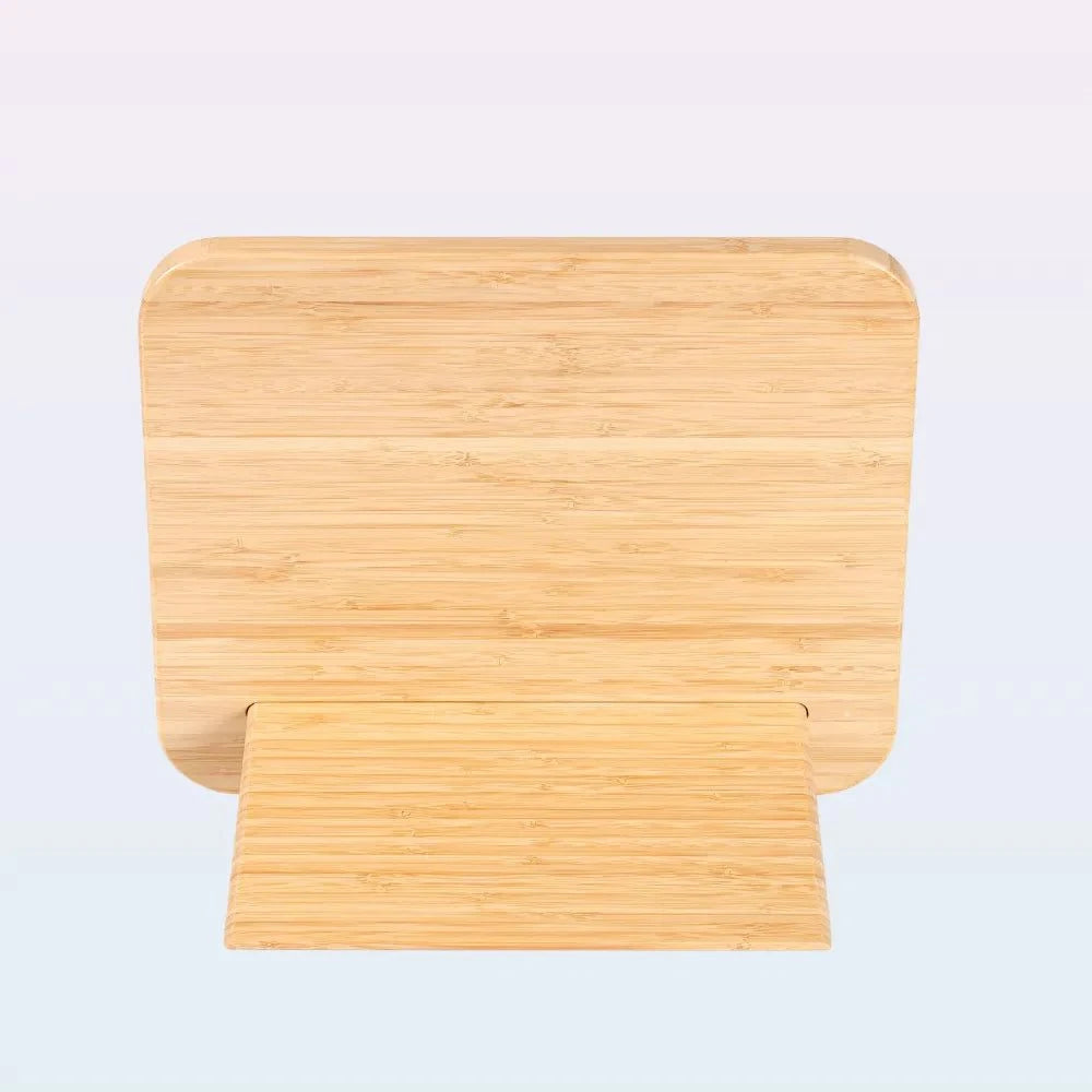 A light natural bamboo folding stand with a rectangular backplate and a hinged lower support arm, shown against a plain light background.