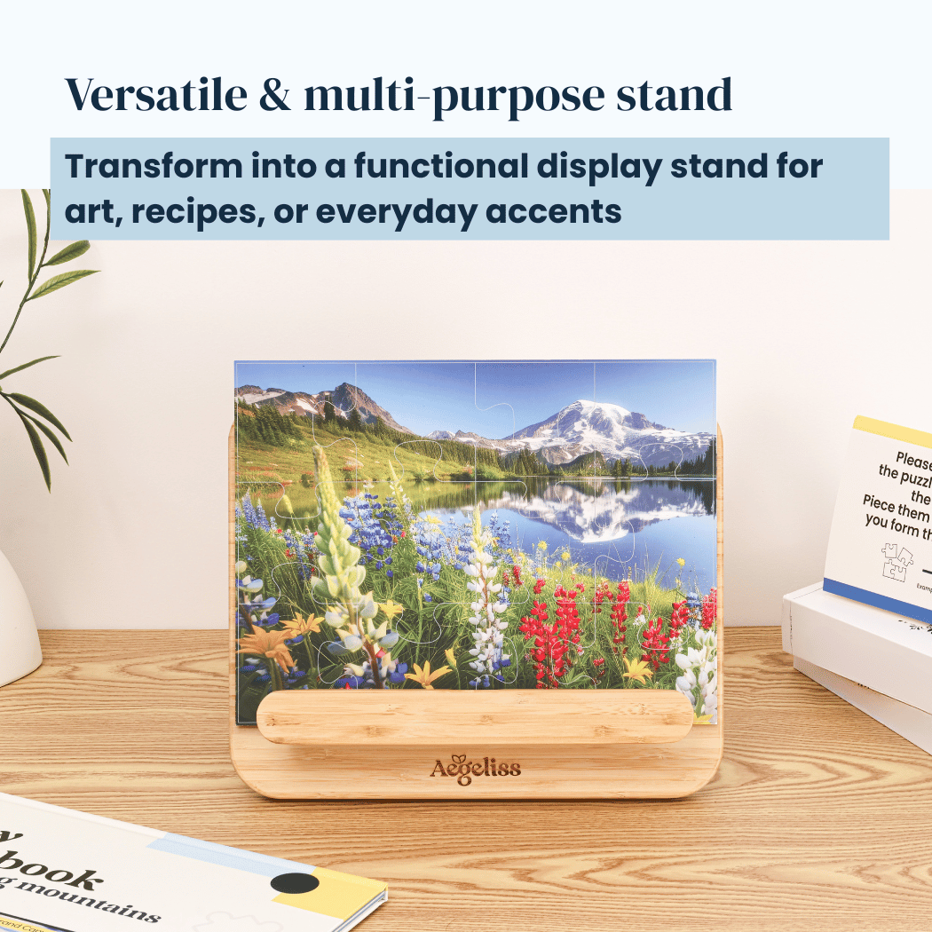 Display Stand in natural bamboo with a rounded base and front ledge holding a colorful mountain landscape puzzle